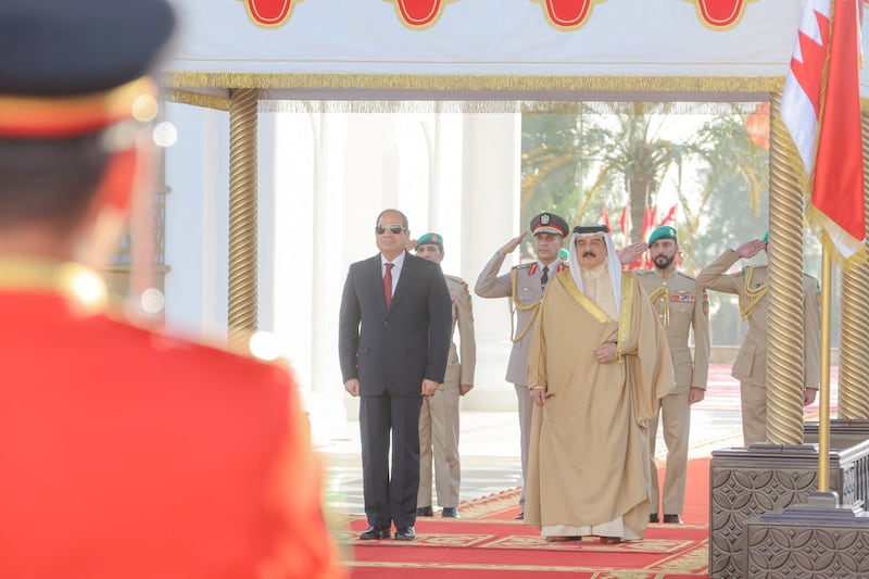King Hamad and Mr El Sisi at the air base. Reuters