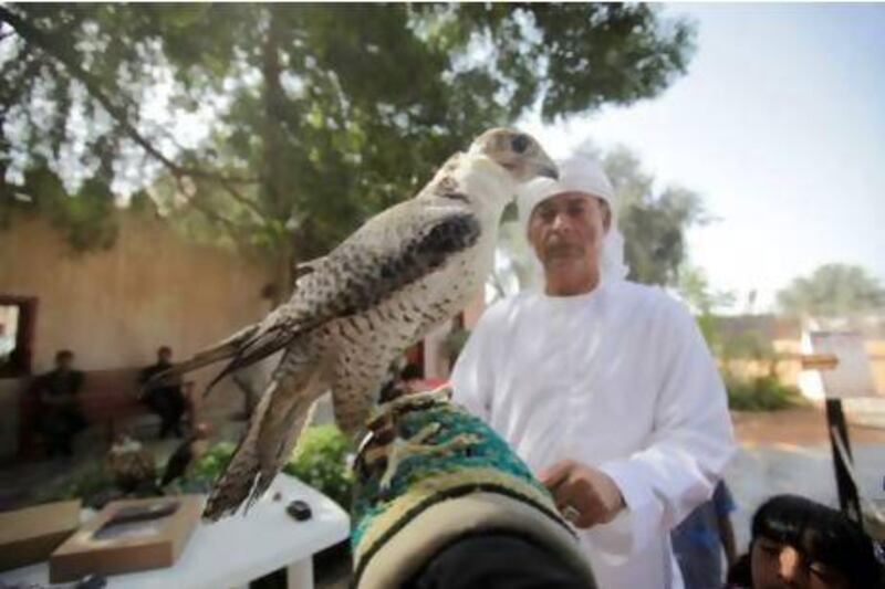 Abdullah Mian Sodagar shows off his falcons at Heritage Village in Abu Dhabi.