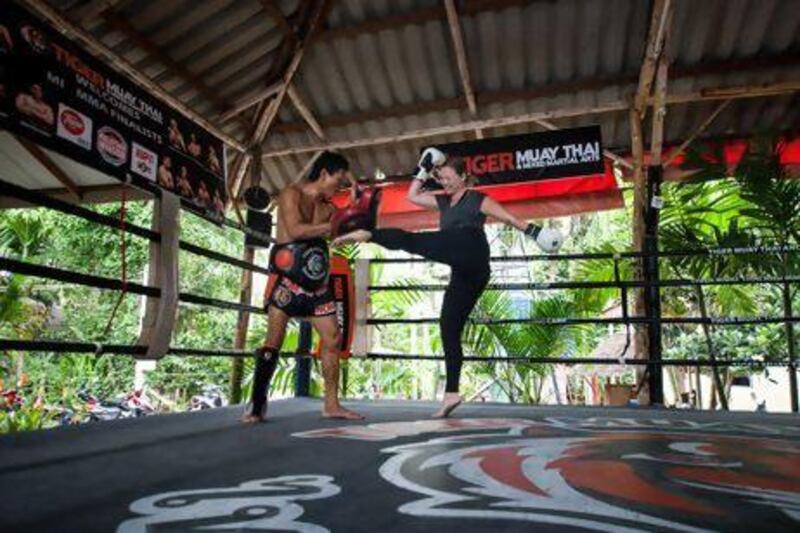 Laura Koot trains with Big Nong at Tiger Muay Thai in Phuket, Thailand. Photo by Mitch Viquez