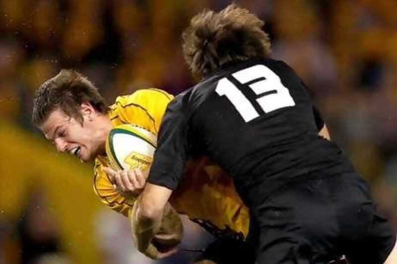 Australia's Rob Horne, left, will miss Tri Nations play due to a small fracture in his right elbow.