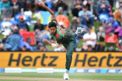 (FILES) In this file photo taken on February 16, 2019 Bangladesh's Mustafizur Rahman bowls during the second one-day international cricket match between New Zealand and Bangladesh at Hagley Oval in Christchurch. Two Bangladeshi cricketers who along with the rest of the squad narrowly survived last week's mosque attacks in New Zealand are getting married, they and family members said on March 22.
 / AFP / Marty MELVILLE
