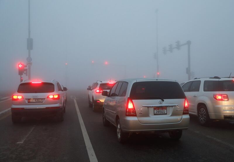 Abu Dhabi, United Arab Emirates, December 30, 2019.  
Intersection at Etihad Plaza on a foggy morning at Khalifa City, Abu Dhabi.
Victor Besa / The National
Section:   NA 
Reporter: