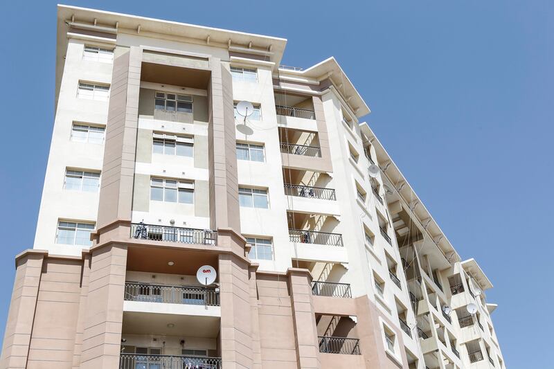 DUBAI, UNITED ARAB EMIRATES, 30 APRIL, 2015. Stock photography of apartment buildings in International City developed by Nakheel. Balcony's used for storage or drying clothes. (Photo: Antonie Robertson) Journalist: STOCK. Section: Business. *** Local Caption ***  AR_3004_Stock_International_City03.JPG