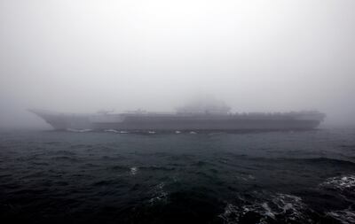 FILE PHOTO: Chinese Navy’s Aircraft carrier Liaoning takes part in a naval parade off the eastern port city of Qingdao, to mark the 70th anniversary of the founding of Chinese People's Liberation Army Navy, China, April 23, 2019. REUTERS/Jason Lee/File Photo