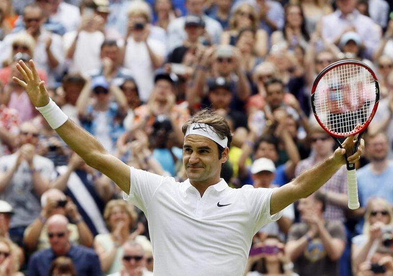 Roger Federer of Switzerland celebrates after beating Steve Johnson of the U.S in their men's singles match on day eight of the Wimbledon Tennis Championships in London, Monday, July 4, 2016. (AP Photo/Kirsty Wigglesworth)