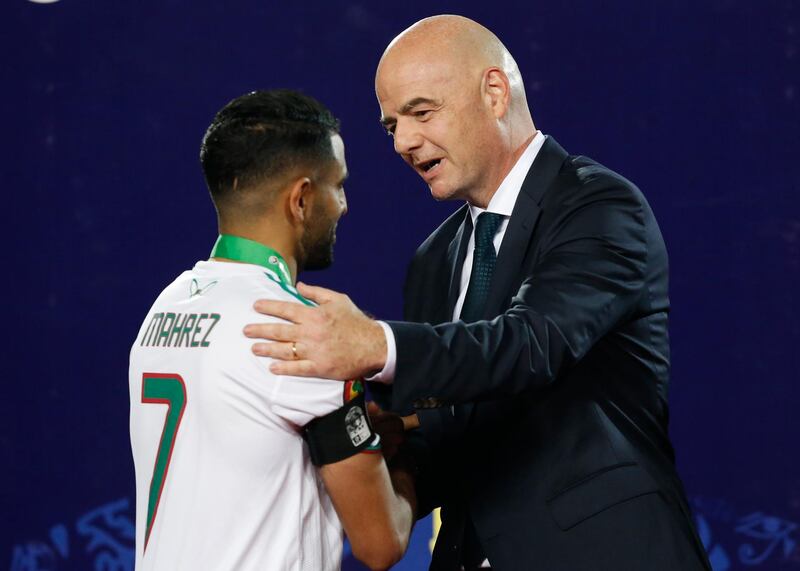 Fifa president Gianni Infantino, greets Algeria's Riyad Mahrez, after the African Cup of Nations final. AP