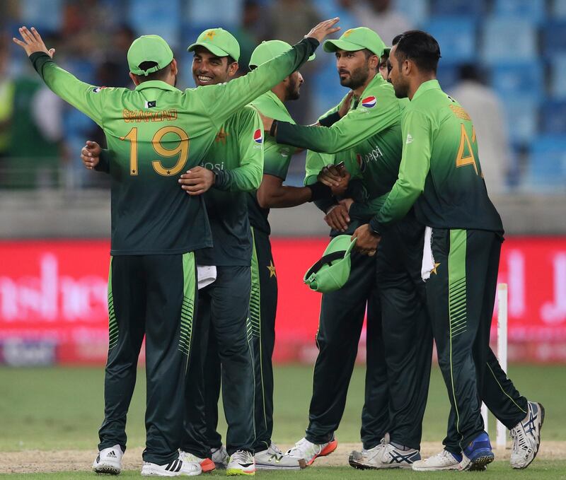 Pakistan's players celebrate after they won their first ODI cricket match against Sri Lanka in Dubai, United Arab Emirates, Friday, Oct. 13, 2017. (AP Photo/Kamran Jebreili)