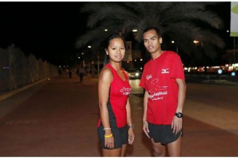 Amor Bautista, left, and Euca Bolingot are members of Filipino Runners UAE, a group of 34 who plan to run the Dubai Marathon this month.