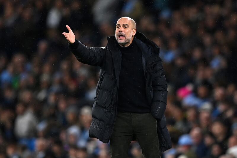 City coach Pep Guardiola shouts instructions. Getty