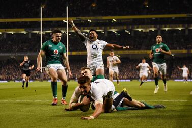 England's Manu Tuilagi celebrates as Henry Slade scores their third try against Ireland. Reuters