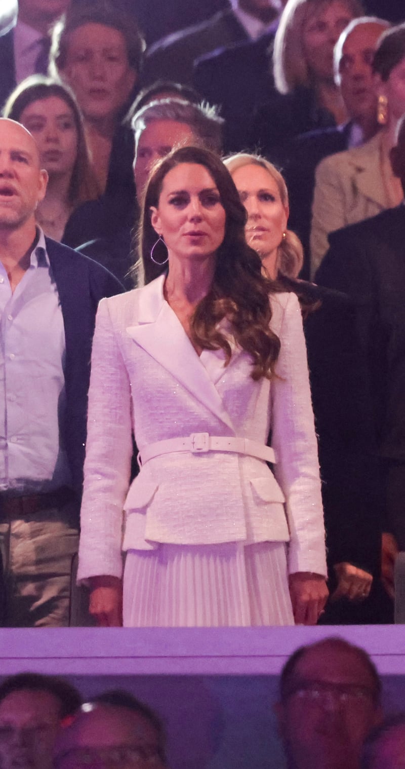 The Duchess of Cambridge wears a cream Self-Portrait dress, with a boucle blazer top and chiffon skirt, to attend the platinum jubilee concert on June 4. AP 