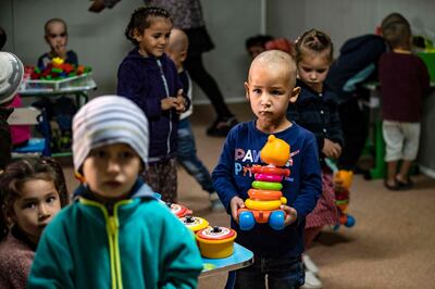 Children play at the centre for relatives of ISIS fighters. AFP