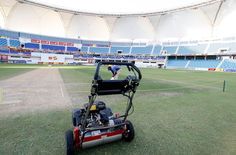 Dubai, United Arab Emirates, Oct 27 2011, Second day  Pakistan v Sri lanka-A Grounds keeper prepares the wicket prior to the match at the Dubai Sports City Cricket Stadium . Mike Young / The National?