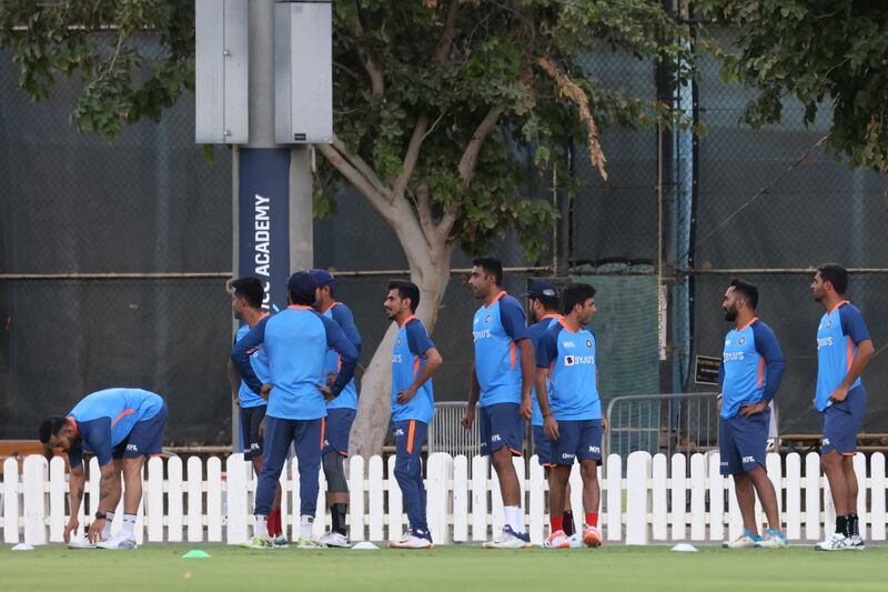 The players during the practice session. AFP