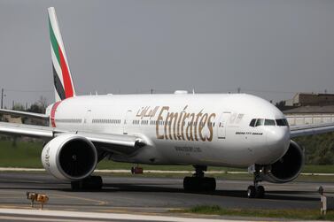 An Emirates Airlines Boeing 777-300ER prepares to take off. REUTERS