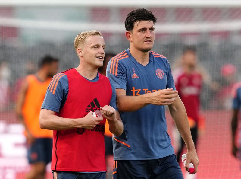 United's Harry Maguire and Donny van de Beek during training. Reuters