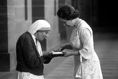 Mother Teresa with Queen Elizabeth II in New Delhi, India, November 1, 1983. PA