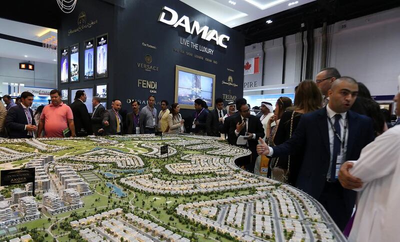 Visitors at the Damac stand at Cityscape Global held at Dubai World Trade Centre in Dubai. Pawan Singh / The National