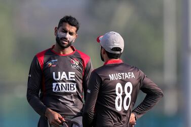 Ahmed Raza and Rohan Mustafa have their task cut out during the T20 World Cup qualifier. Chris Whiteoak / The National