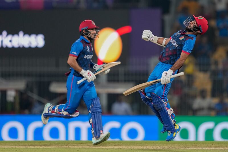 Afghanistan's captain Hashimatullah Shahidi, right, and Rahmat Shah celebrate after their eight-wicket win against Pakistan in the ICC Men's Cricket World Cup match in Chennai, on Monday, October 3, 2023. AP