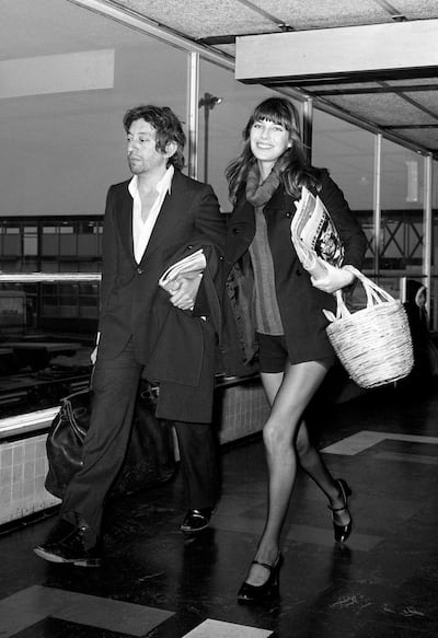 Actress Jane Birkin with Serge Gainsbourg at London's Heathrow Airport after arriving from Paris.   (Photo by PA Images via Getty Images)