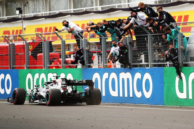 Mercedes team members celebrate Lewis Hamilton winning in Hungary. Getty