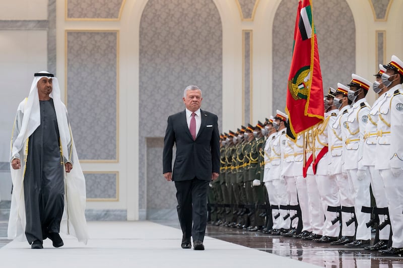 Sheikh Mohamed bin Zayed, Crown Prince of Abu Dhabi and Deputy Supreme Commander of the Armed Forces, and King Abdullah II of Jordan inspect the UAE's honour guard during a reception at the Presidential Airport. All photos: Ministry of Presidential Affairs