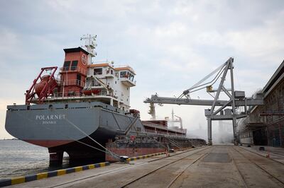 A Turkish cargo ship loading Ukrainian grain in a port in the Odesa region, Ukraine. July 29, 2022. AP