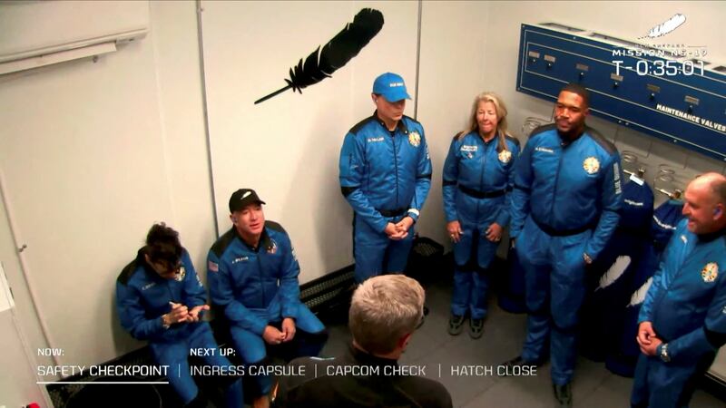 Billionaire Jeff Bezos, founder of e-commerce company Amazon and Blue Origin, with the crew before the commercial space flight near Van Horn, Texas. Reuters