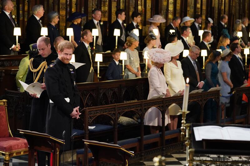 WINDSOR, UNITED KINGDOM - MAY 19:  Prince Harry and Meghan Markle stand at the altar during their wedding in St George's Chapel at Windsor Castle on May 19, 2018 in Windsor, England. (Photo by Jonathan Brady - WPA Pool/Getty Images)