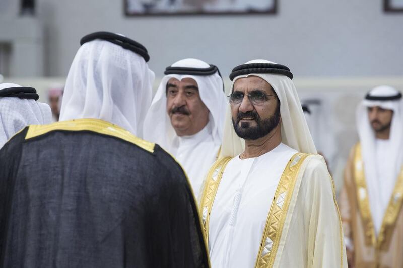 Sheikh Mohammed bin Rashid, Vice President and Ruler of Dubai and Sheikh Saud bin Rashid Al Mu’alla, Ruler of Umm Al Quwain, greet grooms during a group wedding at Mushrif Palace. Ryan Carter / Crown Prince Court - Abu Dhabi