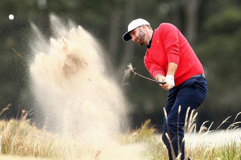 epa08061502 Dustin Johnson of the USA team plays a shot during a practice session at the 2019 Presidents Cup golf competition at the Royal Melbourne Golf Club in Melbourne, Australia, 11 December 2019. The tournament will take place from 12 to 15 December.  EPA/ROB PREZIOSO EDITORIAL USE ONLY AUSTRALIA AND NEW ZEALAND OUT