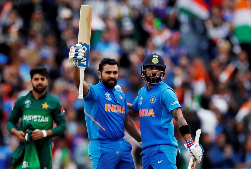 FILE PHOTO: Cricket - ICC Cricket World Cup - India v Pakistan - Emirates Old Trafford, Manchester, Britain - June 16, 2019   India's Rohit Sharma celebrates his century with Virat Kohli   Action Images via Reuters/Lee Smith/File Photo