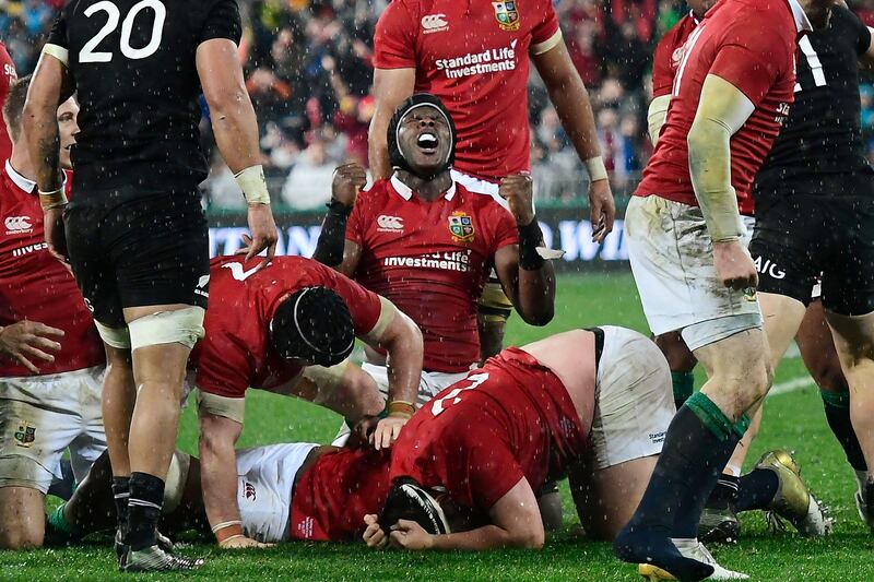 British & Irish Lions' lock Maro Itoje, centre, celebrates winning the second rugby union Test against the New Zealand All Blacks in Wellington on July 1, 2017.