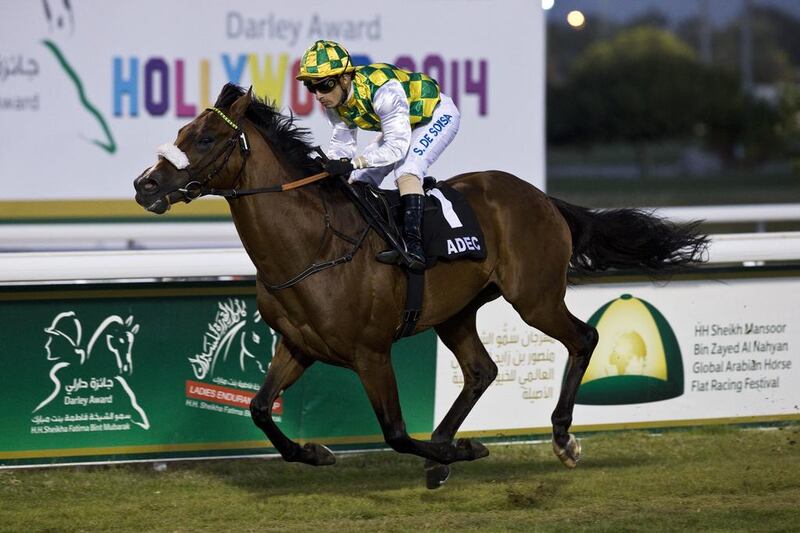 Areem carries Silvestre De Sousa to the win in the Liwa Oasis during the 13th race meeting of the season held at the Abu Dhabi Golf and Equestrian Club on March 2, 2014. Antonie Robertson / The National