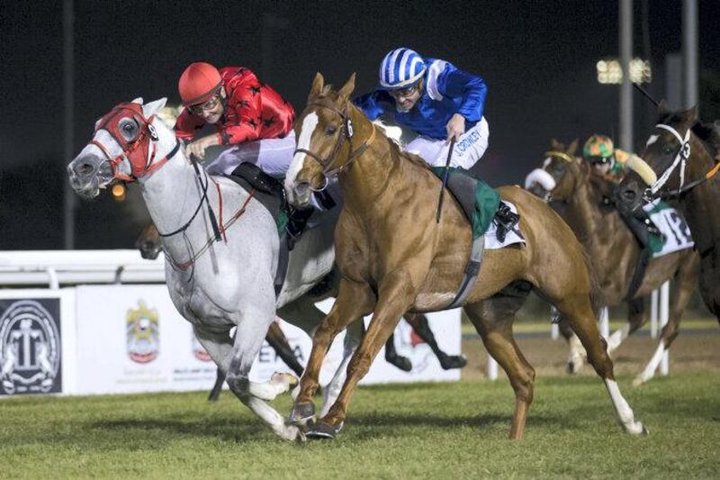 Muraaqib, right, tussles with RB Burn in the €1.2million Group 1 Sheikh Zayed bin Sultan Al Nahyan Jewel Crown race at Abu Dhabi Racecourse on Friday. After a stewards inquiry, Muraaqib, who had finished second, was awarded the race win. Erika Rasmussen for The National