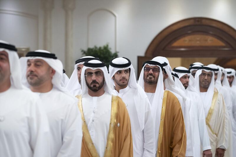 ABU DHABI, UNITED ARAB EMIRATES - June 04, 2019: HE Hussain Ibrahim Al Hammadi, UAE Minister of Education (4th L) and other guests, attend an Eid Al Fitr reception at Mushrif Palace. 

( Mohamed Al Hammadi / Ministry of Presidential Affairs )
---