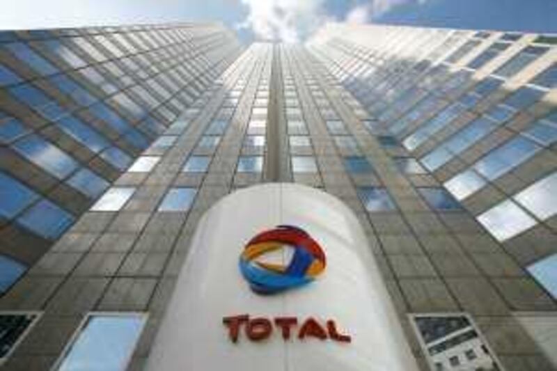 View of Total headquarters outside Paris, Wednesday March 11, 2009. French oil giant Total SA said Tuesday March 11, 2009 it plans to cut 555 jobs from its refining and petrochemical operations in France over the next three years as it adapts production to falling oil consumption. Some unions have criticized the job losses because they come at the same time as Total has reported record profits. (AP Photo/Jacques Brinon)