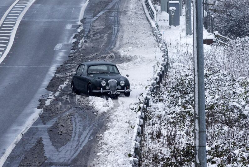 A car stranded on the hard shoulder of the M25 motorway near Epping. Bloomberg