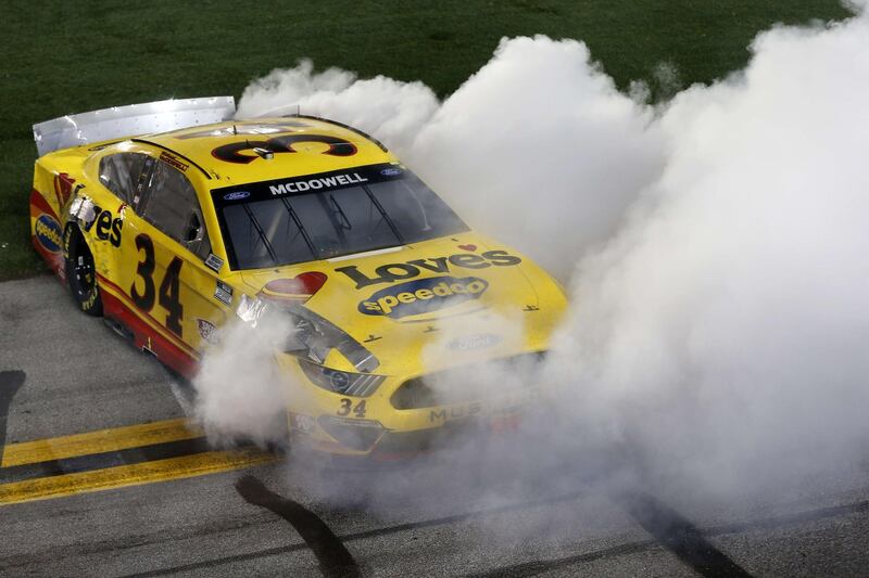 Front Row Motorsports Michael McDowell celebrates after winning the race. AFP