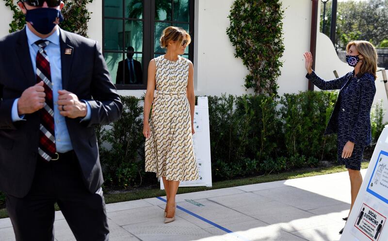 First Lady Melania Trump says goodbye to Wendy Sartory Link, Palm Beach County Supervisor of Elections, right, after voting at the Morton and Barbara Mandel Recreation Centre on Tuesday, November 3, 2020, in Palm Beach, Florida. AP photo