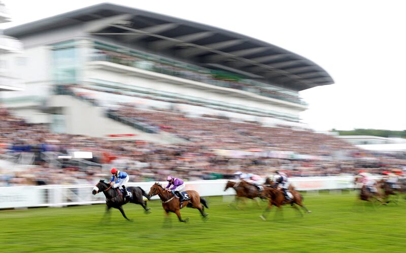 Tees Spirit ridden by Barry McHugh on their way to winning the Simpex Express ‘Dash’ Handicap at the Derby festival at Epsom Racecourse in Surrey, England. Reuters