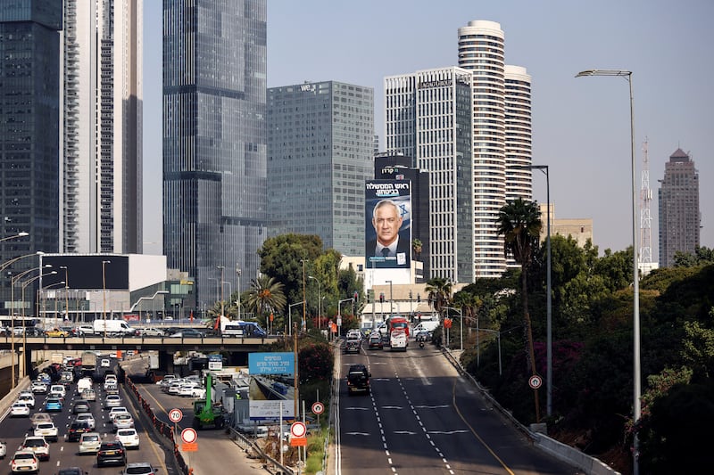 A giant image of National Unity's Benny Gantz looks over one of the motorways into Tel Aviv. Reuters