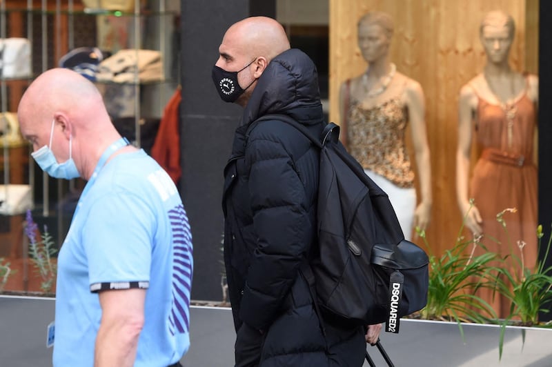 Manchester City manager Josep Guardiola arrives at the team hotel in Porto ahead of the Champions League final against Chelsea. AFP
