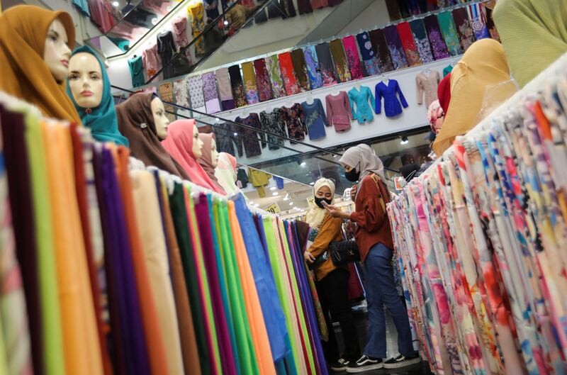 Shopping for clothes in preparation for Eid Al Fitr in Kuala Lumpur, Malaysia.  Reuters 