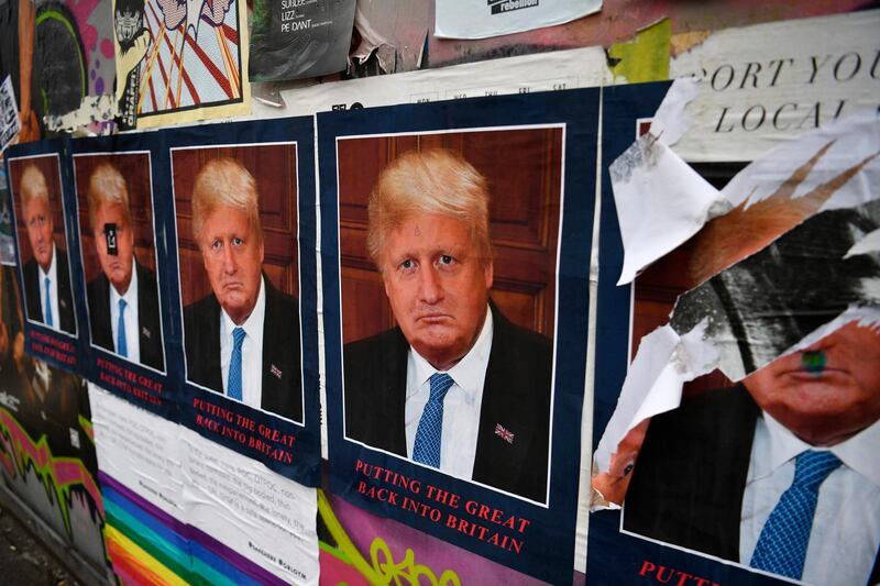 epa07745610 Artist STOT21stcplanB's work 'Boris Borump' which depicts both US President Donald Trump and British Prime Minister Boris Johnson is displayed on a wall in east London, Britain 28 July 2019. Boris Johnson defeated Jeremy Hunt to become the new British Prime Minister.  EPA/NEIL HALL