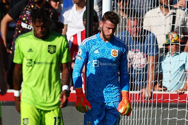 Manchester United's David de Gea looks dejected after Brentford's Josh Dasilva scores their first goal. Reuters
