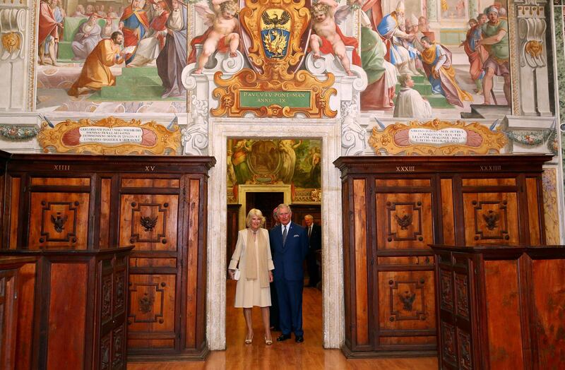 FILE PHOTO: Britain's Prince Charles and his wife Camilla, Duchess of Cornwall, visit archives that were known as the Vatican Secret Archives, April 4, 2017. The archives have been renamed by the pope. REUTERS/Alessandro Bianchi/File Photo