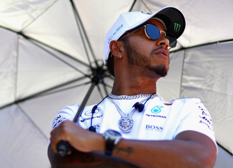 SAO PAULO, BRAZIL - NOVEMBER 12:  Lewis Hamilton of Great Britain and Mercedes GP looks on on the drivers parade before the Formula One Grand Prix of Brazil at Autodromo Jose Carlos Pace on November 12, 2017 in Sao Paulo, Brazil.  (Photo by Dan Istitene/Getty Images)