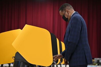 Conservative talk show host and gubernatorial recall candidate Larry Elder votes at a polling station in Los Angeles, California, on September 8, 2021 ahead of the special recall election.  AFP